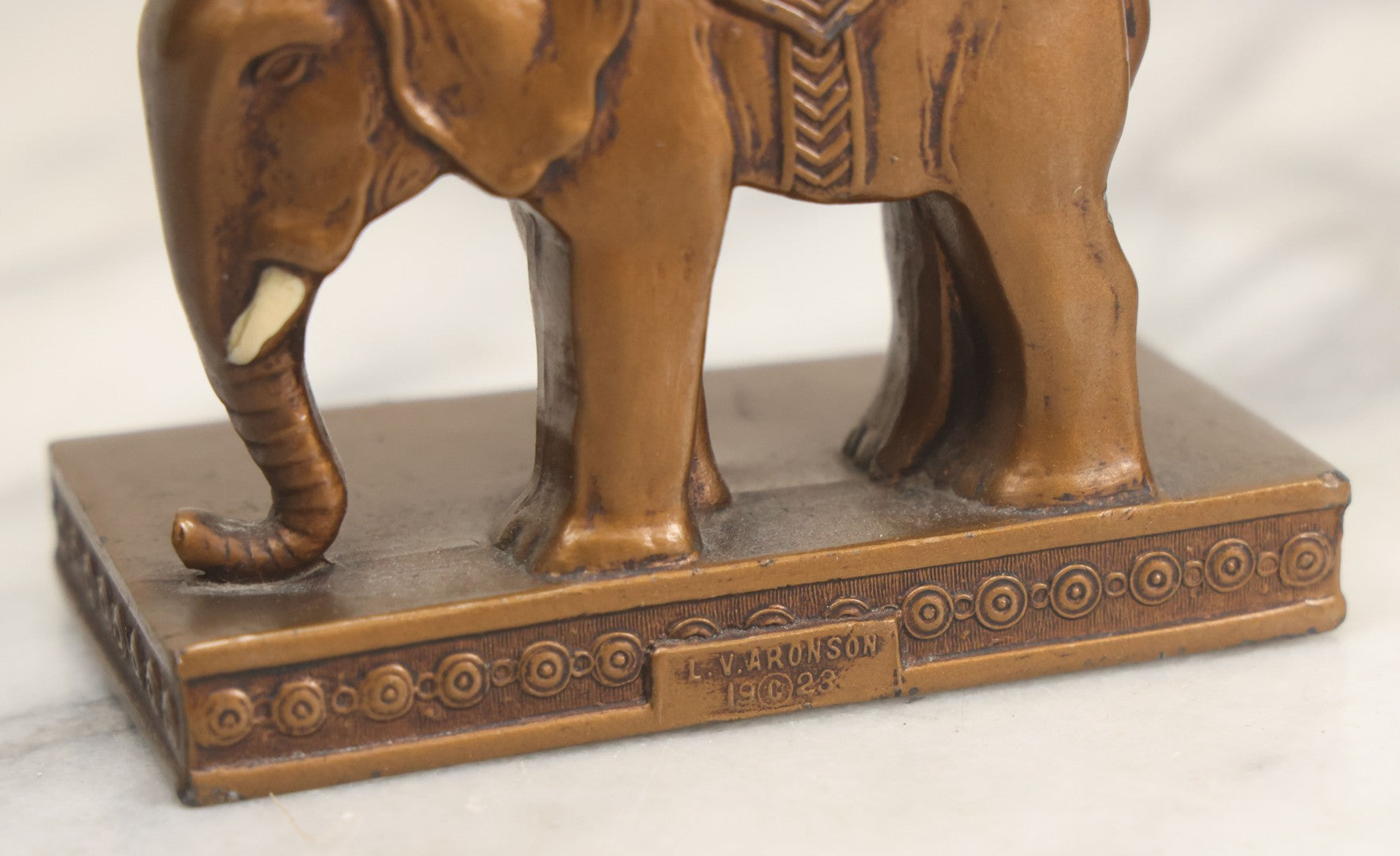 Lot 025 - Pair Of Antique Cast Metal Eastern Influence Elephant Bookends In Bronze Paint Finish, Copyright L.V. Aronson, 1923