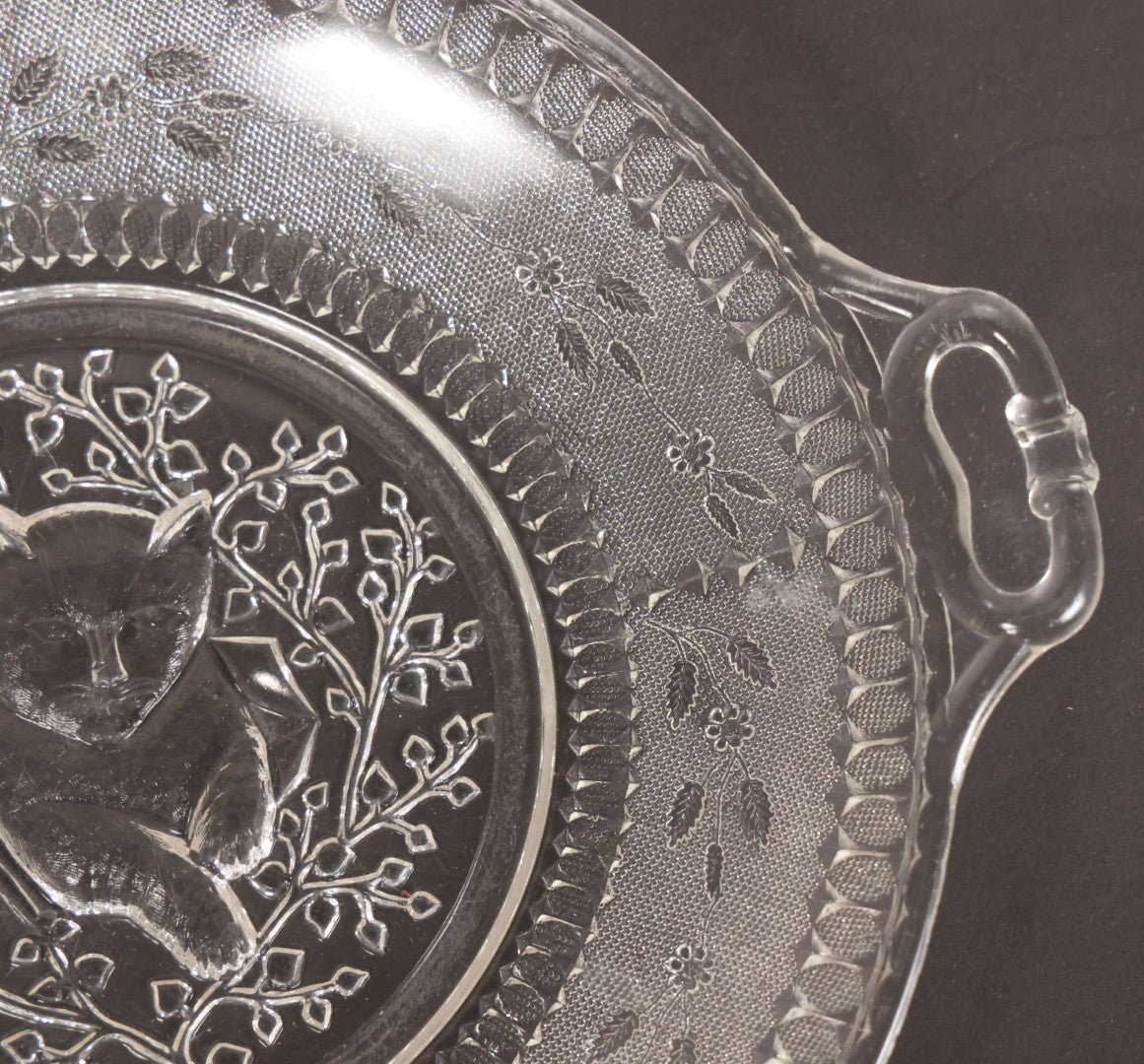 Lot 028 - Antique Early American Pattern Glass E.A.P.G. Plate With Cat Resting In Tree Branches, 9" Diameter