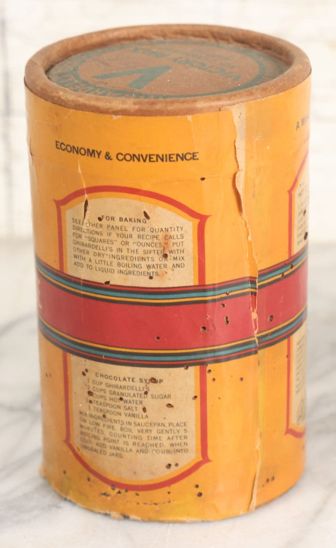 Lot 031 - Vintage Ghirardelli Sweet Ground Chocolate And Cocoa One Pound "Victory Pack" Paper Jar, With Contents, Manufactured By D. Ghirardelli Co., San Francisco, California, 5-1/2" Height