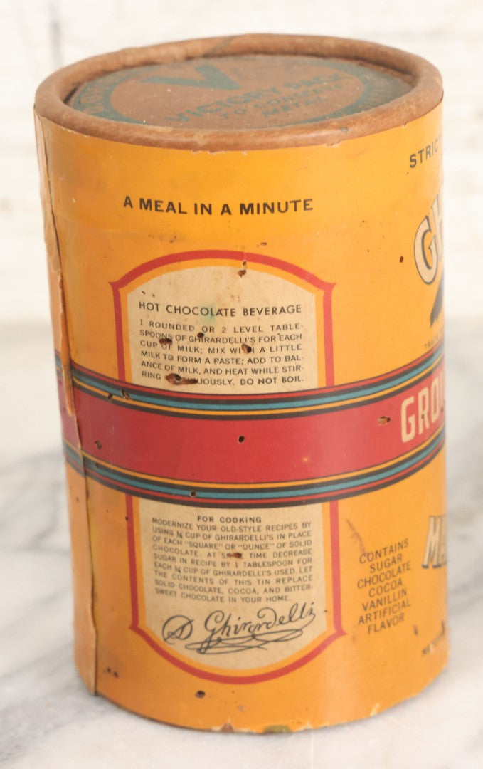 Lot 031 - Vintage Ghirardelli Sweet Ground Chocolate And Cocoa One Pound "Victory Pack" Paper Jar, With Contents, Manufactured By D. Ghirardelli Co., San Francisco, California, 5-1/2" Height