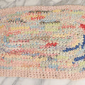 Lot 032 - Vintage Handmade Hooked Oval Rug With Many Bright Colors Including Pink, Red, Green, And Blue, 23" x 12-3/4"