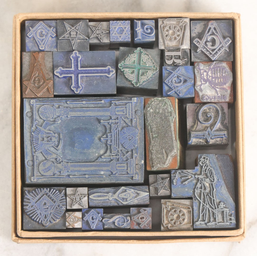 Lot 039 - Grouping Of 26 Vintage Letterpress Printing Blocks Featuring Numerous Fraternal Symbols, Including Freemasons And Order Of Eastern Star, Bedbug Block, And Other Subjects