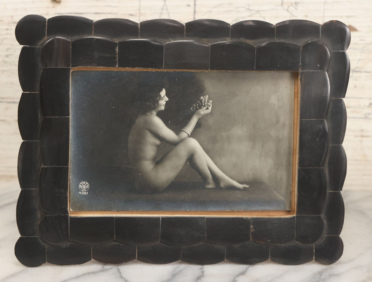 Lot 047 - Pair Of Antique French Nude Postcards Of Women Looking Fondly At Bundle Of Grapes, In Two Poses, Published By Armand Noyer, Series No. 4391, Made In France, In Matching Vintage Frames, 8" x 6" each