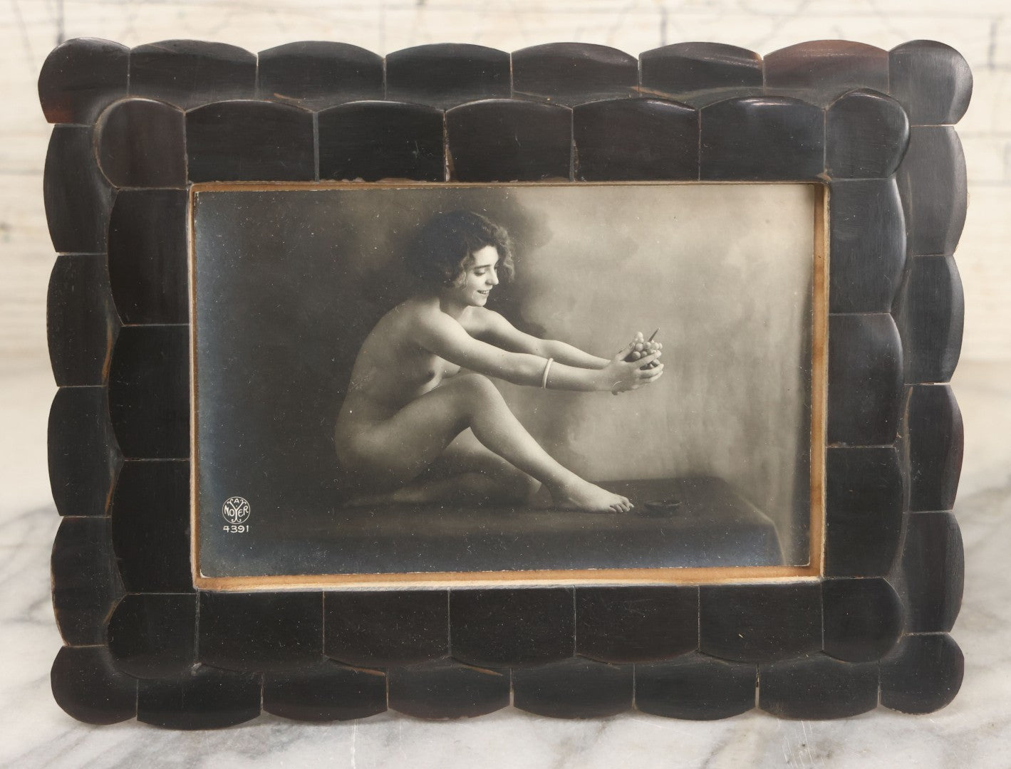 Lot 047 - Pair Of Antique French Nude Postcards Of Women Looking Fondly At Bundle Of Grapes, In Two Poses, Published By Armand Noyer, Series No. 4391, Made In France, In Matching Vintage Frames, 8" x 6" each