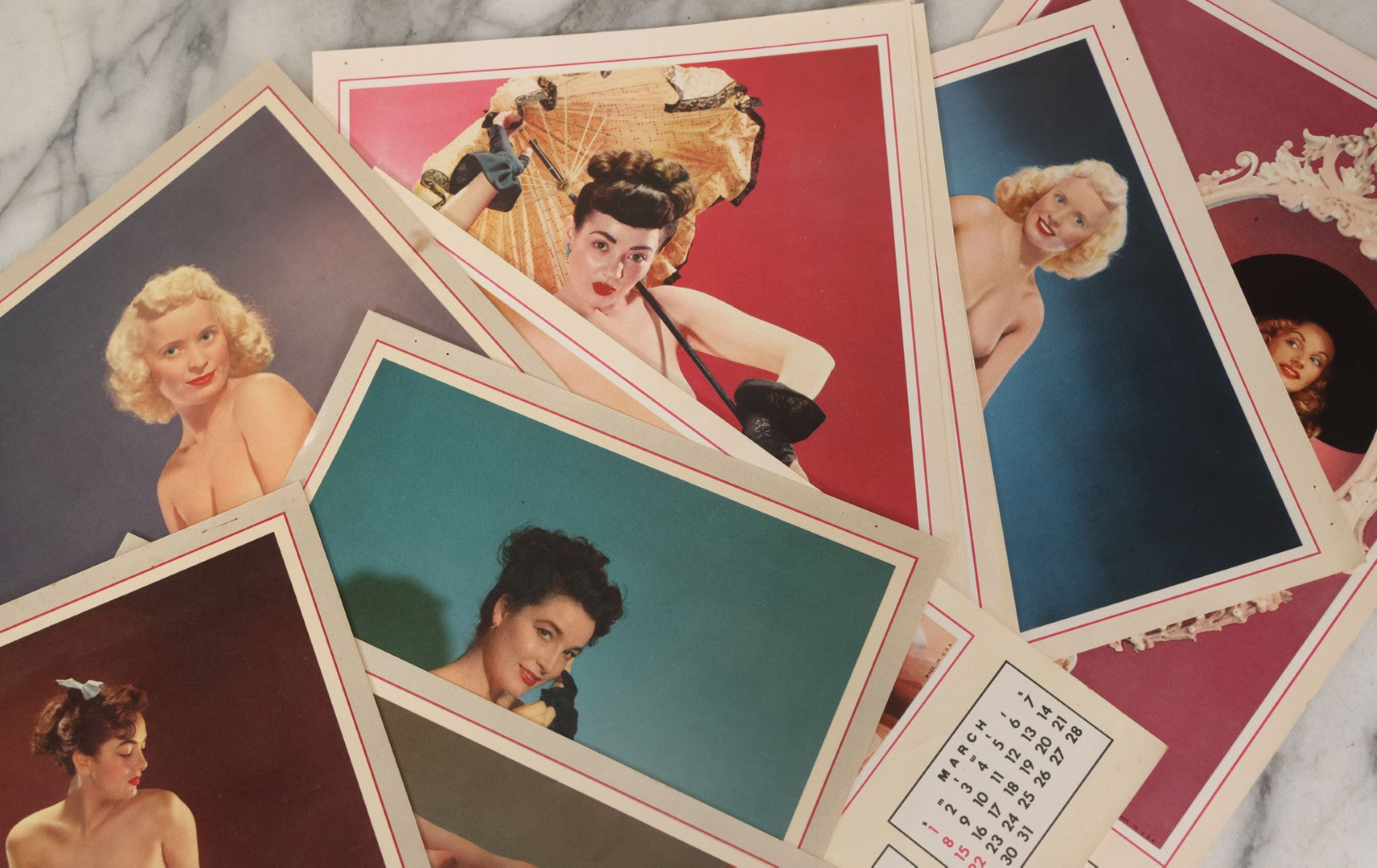 Lot 050 - Grouping Of Twelve Nude Women Pin Up Photograph Calendar Sheets For 1953 And 1954, Made In U.S.A.