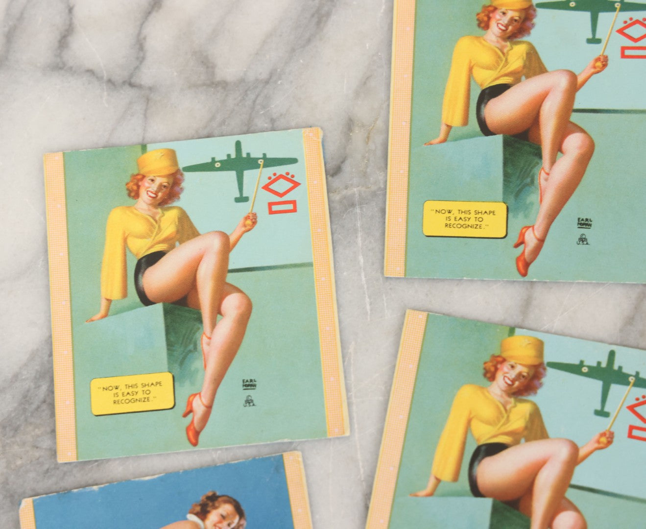Lot 051 - Grouping Of Six Vintage Pinup Advertising Blotter Scraps, Most With Advertising Cut Off, With Risqué Pinup Women Painted By Earl Moran 