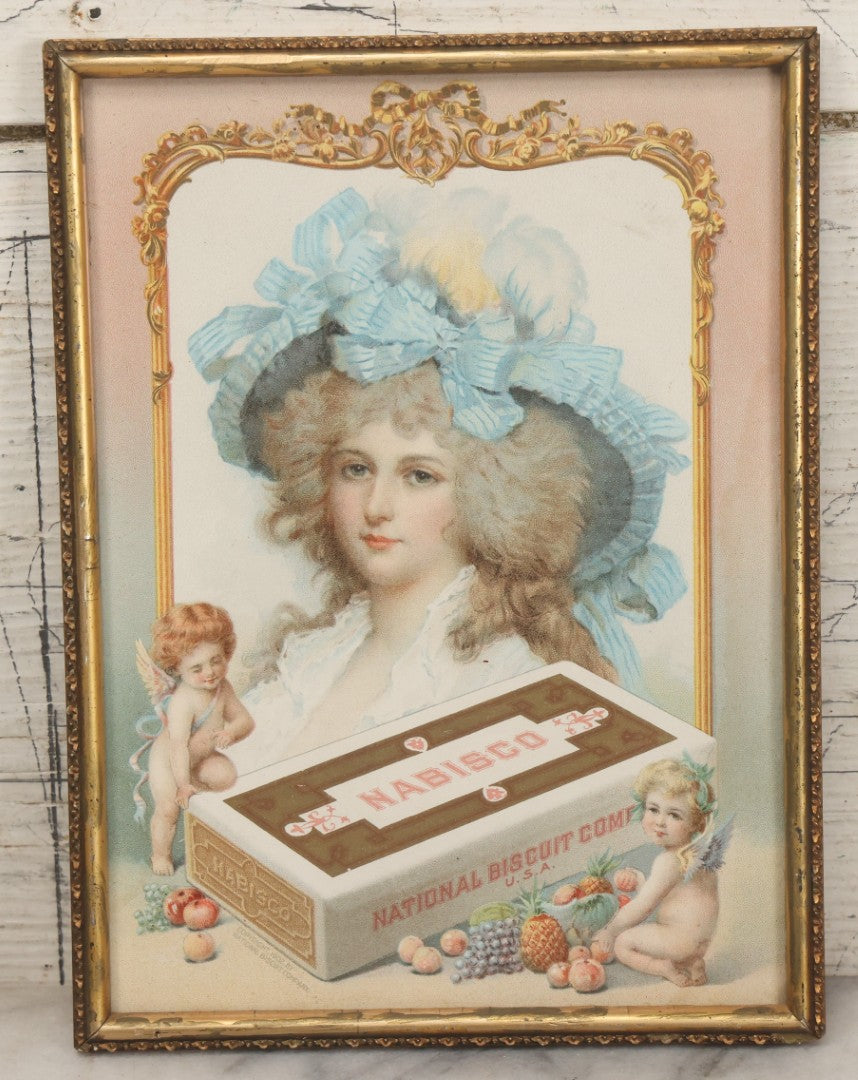 Lot 053 - Antique Nabisco National Biscuit Company Lithographed Advertisement With Woman In Blue Hat And Cherubs, Copyright 1902, In Vintage Frame, 7-1/8" x 9-1/2"
