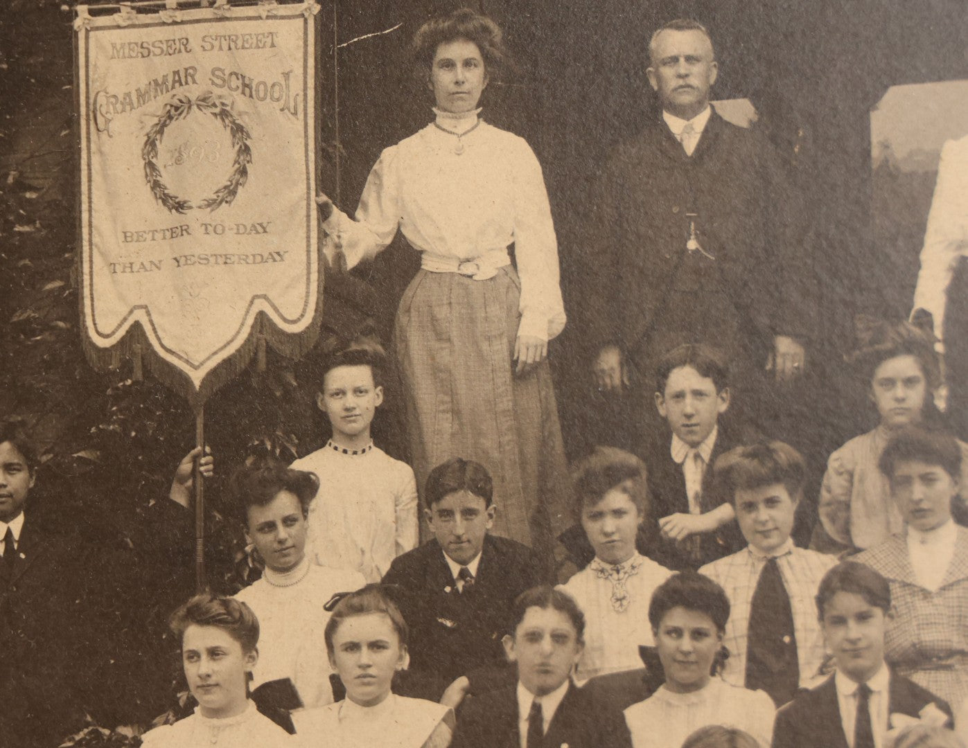 Lot 063 - Antique Boarded Photograph Of The Students And Staff Of The Messer Street Grammar School, Class Of 1893, Posing With Banner On School Steps, William Mills & Son, Photographers, Providence, Rhode Island, In Frame, 18-1/8" x 15-1/8"