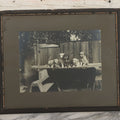 Lot 064 - Antique Boarded Photograph Of Five Happy Puppies Sitting On Lumber In Front Of Fence, In Frame, 16-1/2" x 13-5/8"