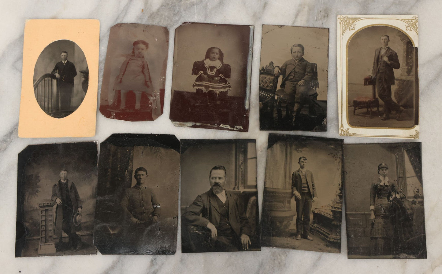 Lot 068 - Grouping Of Ten Antique Tintype Photographs Including Man In Sweater, Man With Well-Groomed Beard, And Strange Slouching Child