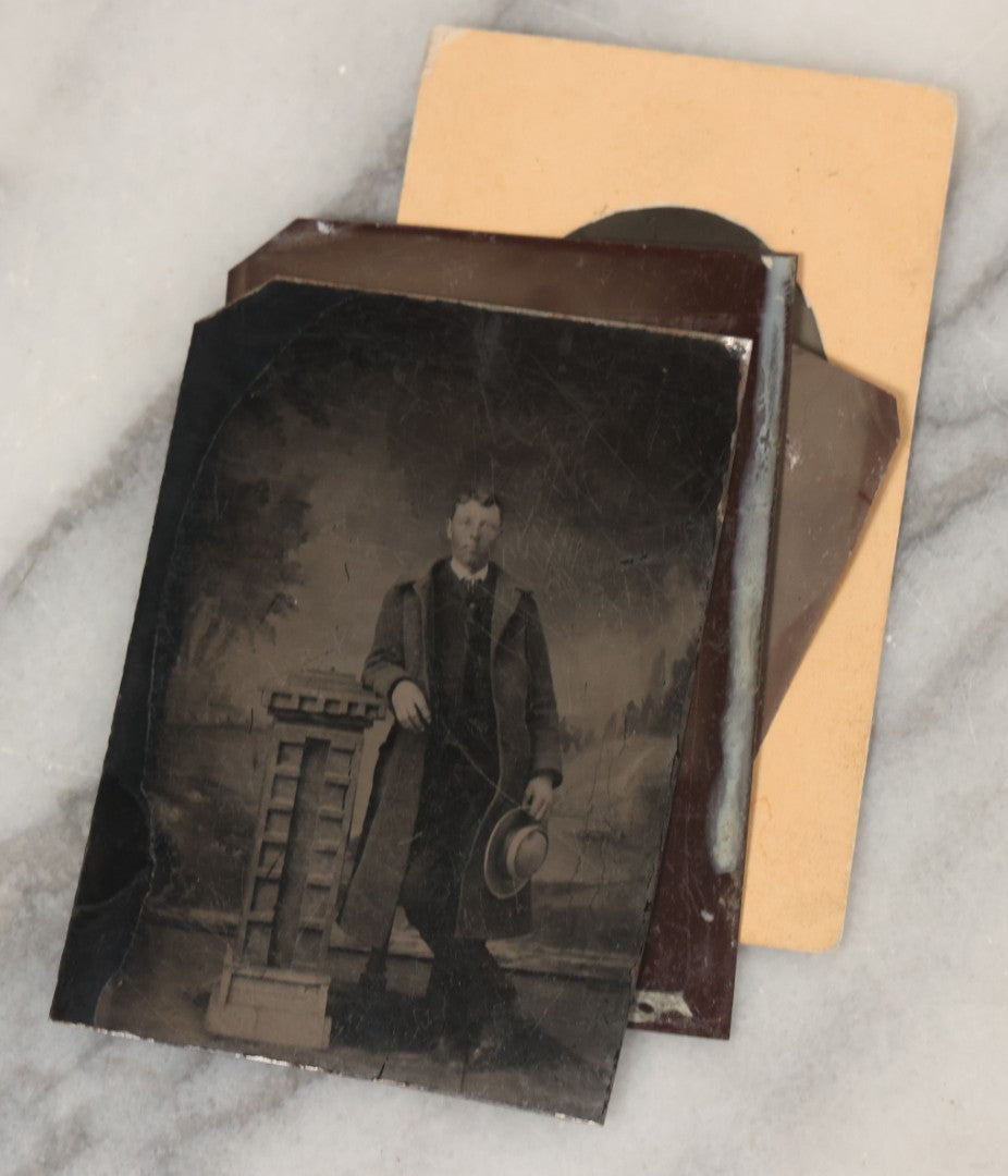 Lot 068 - Grouping Of Ten Antique Tintype Photographs Including Man In Sweater, Man With Well-Groomed Beard, And Strange Slouching Child