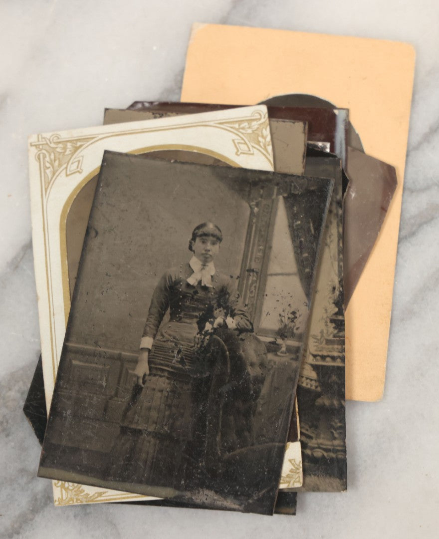 Lot 068 - Grouping Of Ten Antique Tintype Photographs Including Man In Sweater, Man With Well-Groomed Beard, And Strange Slouching Child