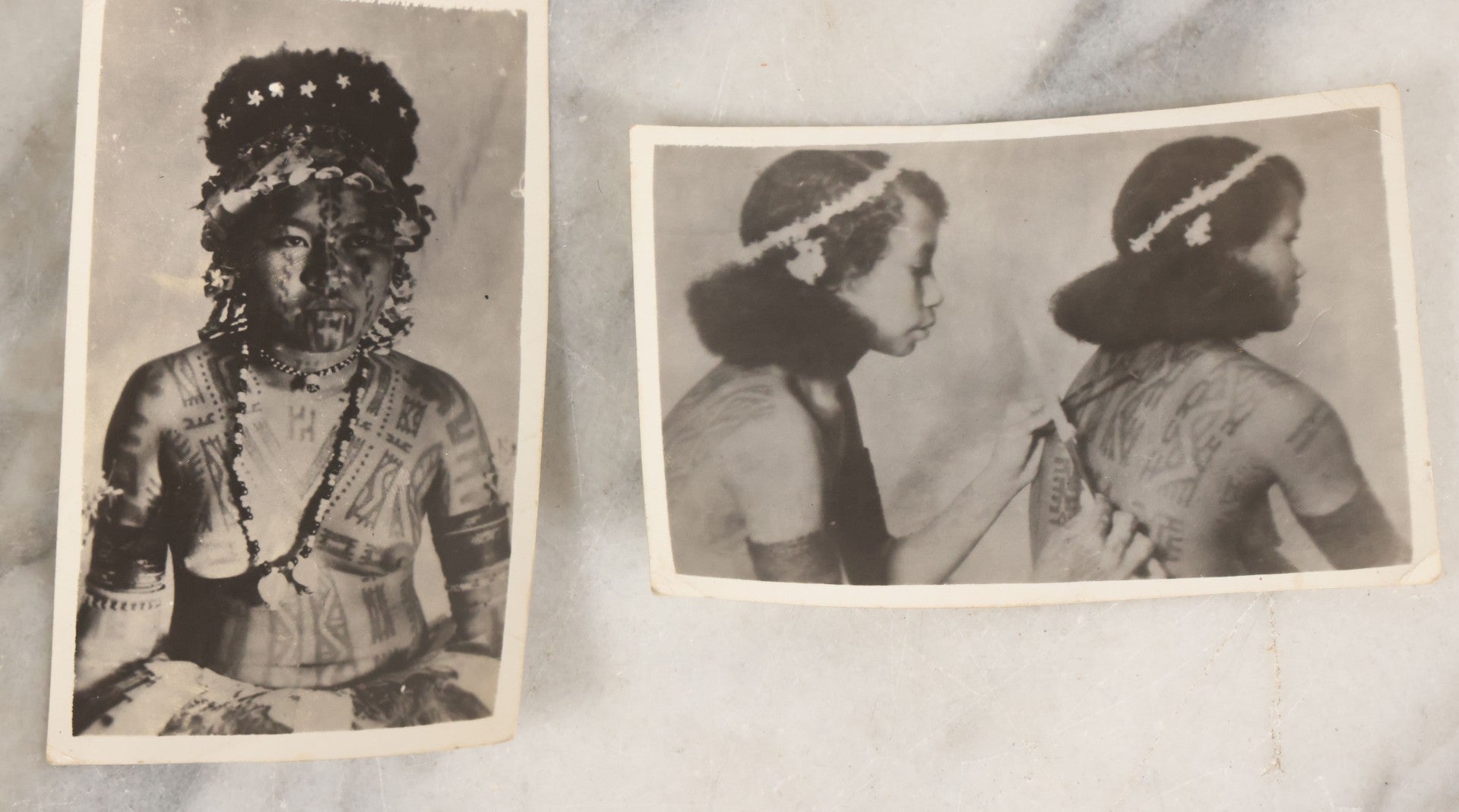 Lot 070 - Grouping Of 26 Vintage Black And White Photographs Of Indigenous Peoples Including Image Of Tattooed Woman And Image Of Tattoo Artist In Practice