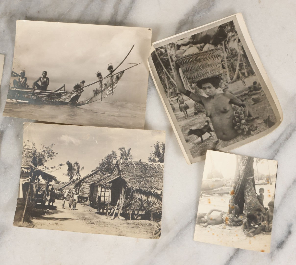 Lot 071 - Grouping Of 32 Vintage Black And White Photographs Of Indigenous Peoples Including Picture Of Man Performing Tribal Dance And Purported Headhunter Tribe Of New Guinea