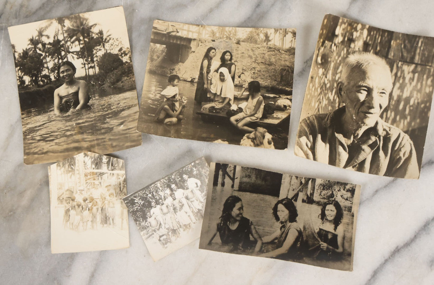 Lot 071 - Grouping Of 32 Vintage Black And White Photographs Of Indigenous Peoples Including Picture Of Man Performing Tribal Dance And Purported Headhunter Tribe Of New Guinea