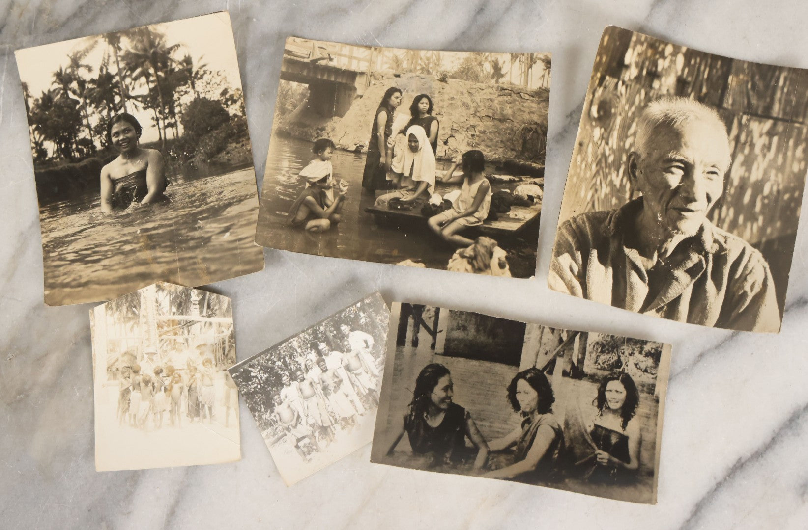 Lot 071 - Grouping Of 32 Vintage Black And White Photographs Of Indigenous Peoples Including Picture Of Man Performing Tribal Dance And Purported Headhunter Tribe Of New Guinea