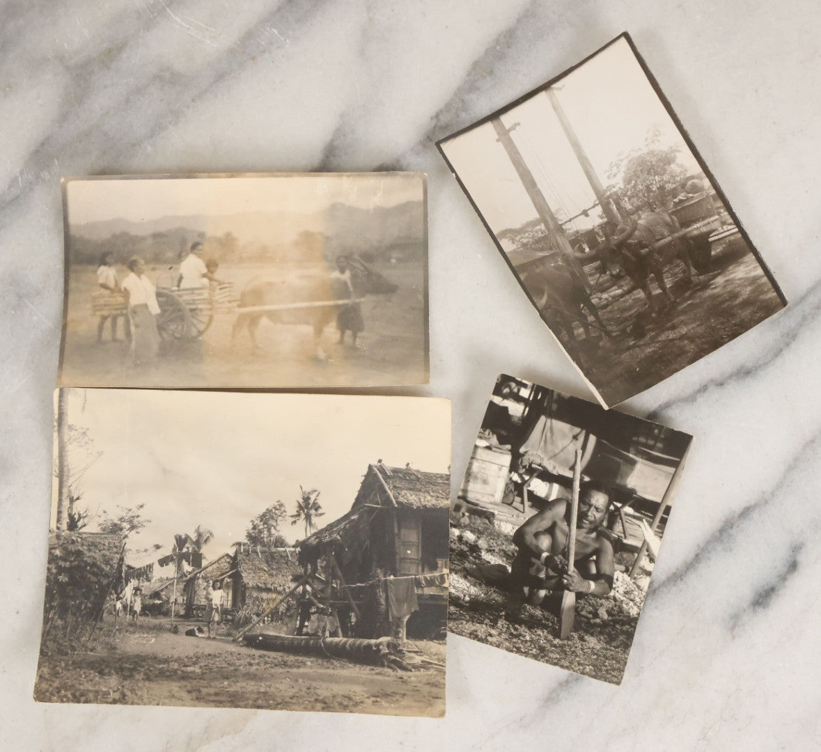 Lot 071 - Grouping Of 32 Vintage Black And White Photographs Of Indigenous Peoples Including Picture Of Man Performing Tribal Dance And Purported Headhunter Tribe Of New Guinea