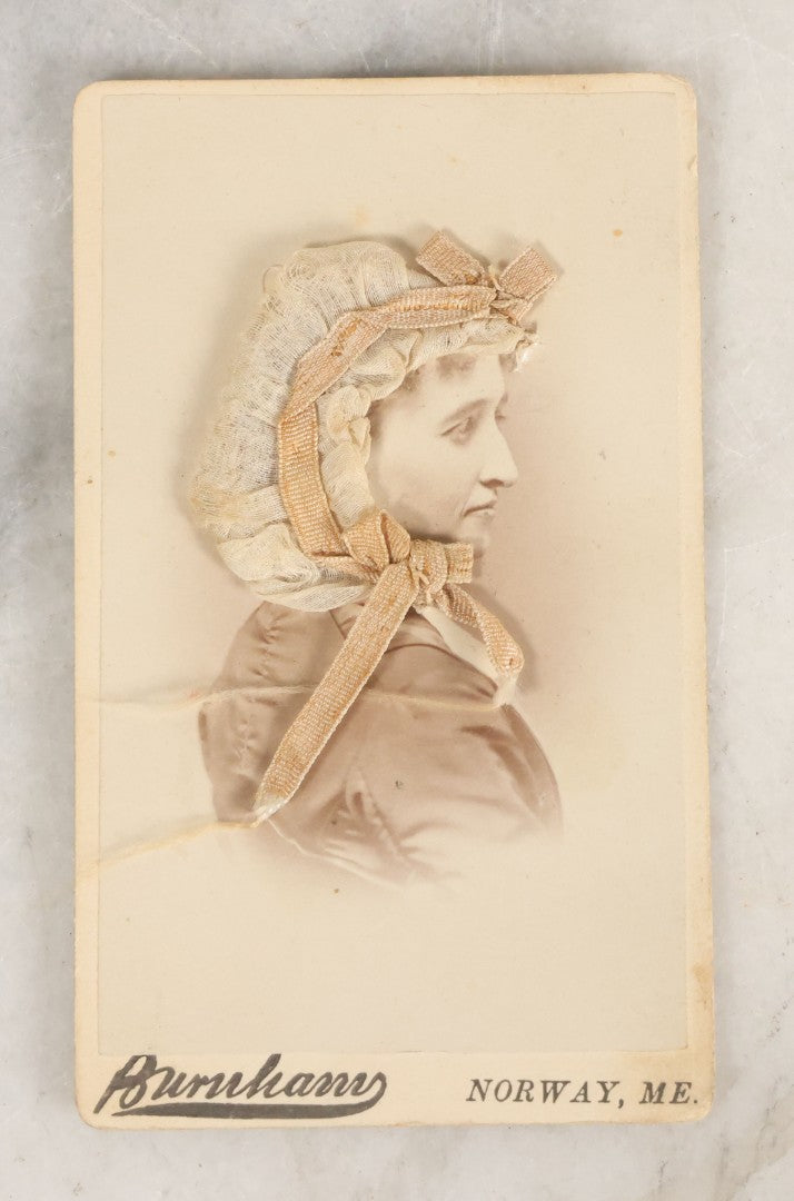 Lot 074 - Antique Carte De Visite C.D.V. Portrait Photograph Of Woman With Handmade Applied Folk Art Textile Bonnet Decoration, Burnham, Photographer, Norway, Maine