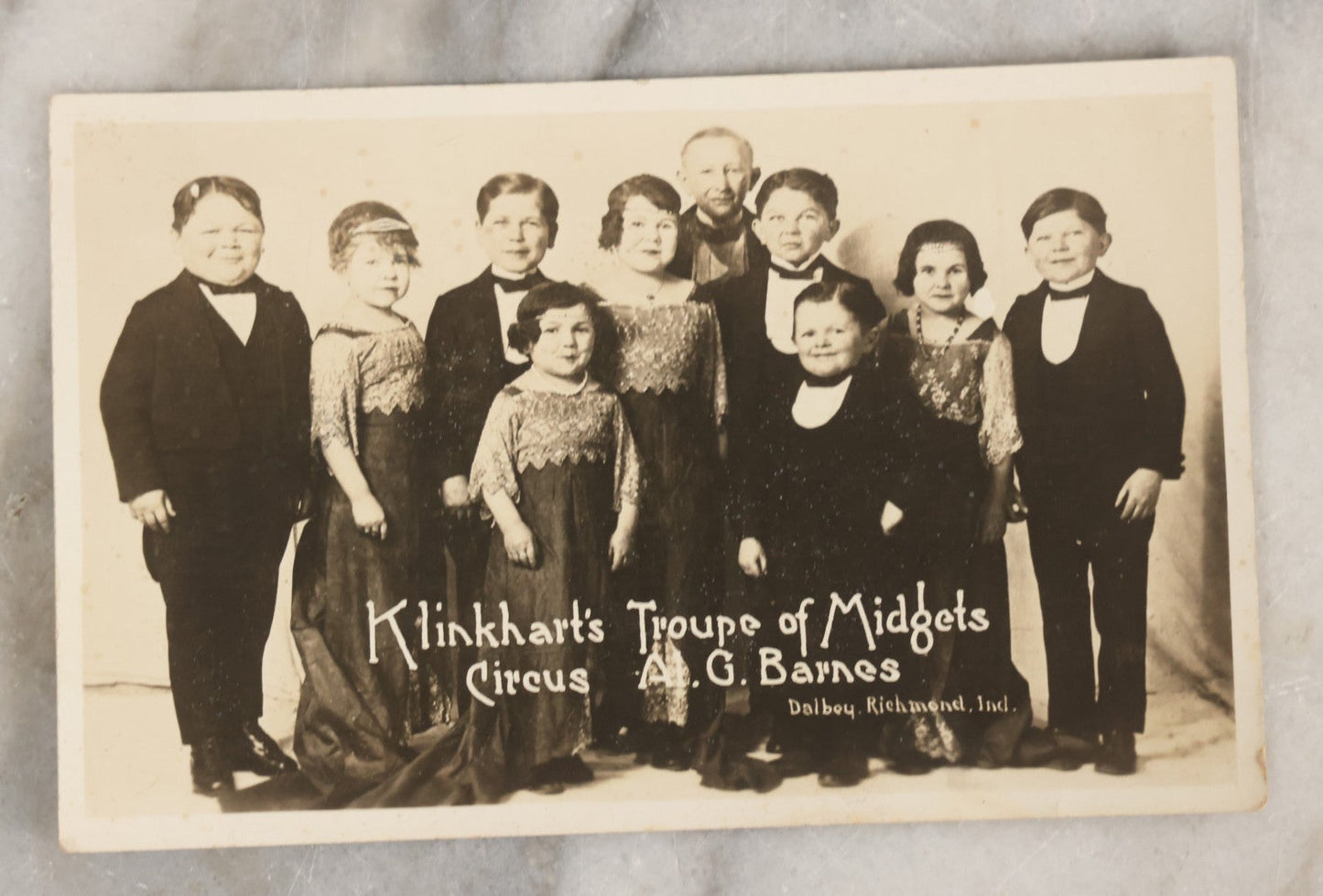 Lot 077 - Antique Sideshow Circus Souvenir Postcard Advertising "Klinkhart's Troupe Of Midgets, Circus A.G. Barnes," Postcard Manufactured By Dalby, Richmond, Indiana
