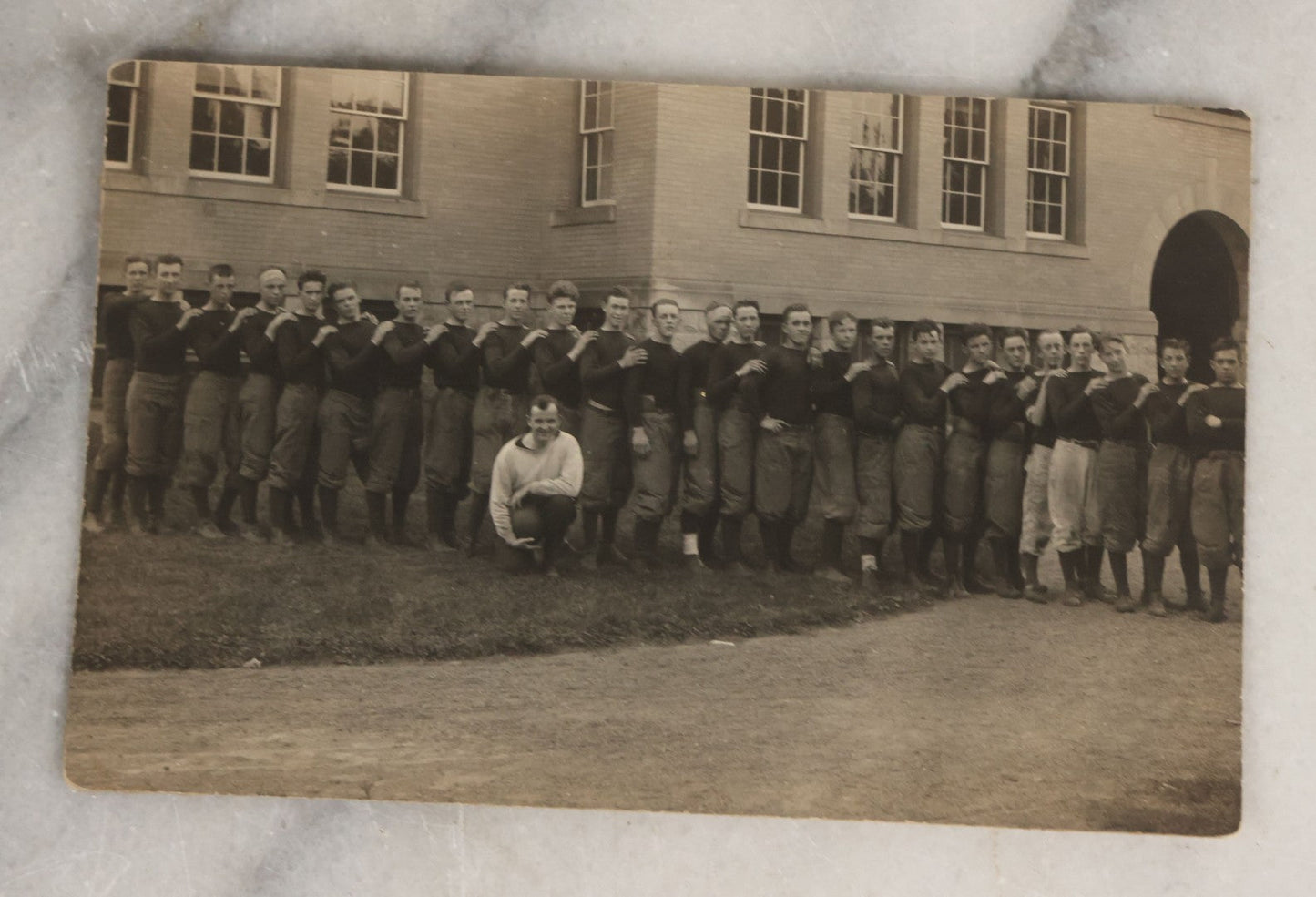 Lot 086 - Grouping Of Fifteen Vintage And Antique Black And White Photographs Of Sports Teams Including 1962 Basketball Team, Early Football Photos, And More