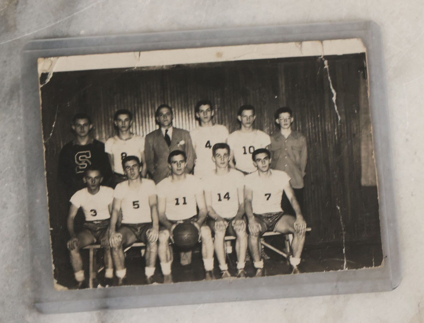 Lot 086 - Grouping Of Fifteen Vintage And Antique Black And White Photographs Of Sports Teams Including 1962 Basketball Team, Early Football Photos, And More
