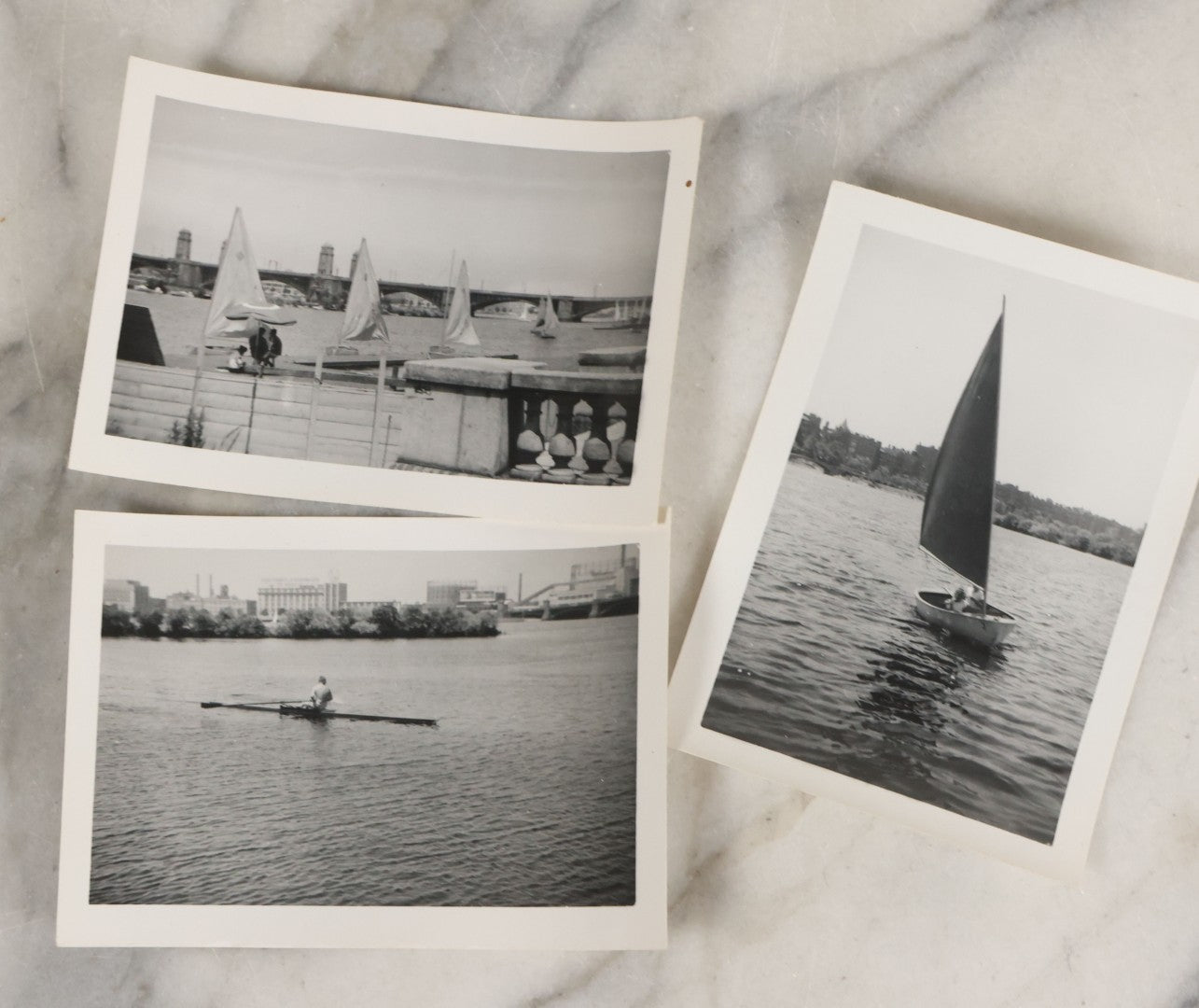 Lot 088 - Grouping Of 25 Vintage Black And White Photographs Of Boating On The Charles River, Boston And Cambridge Mass., Including Photo Of Boston Herald Water Skiers, Sailboats, And Rowing, With Landmarks Including Longfellow Bridge, Universities