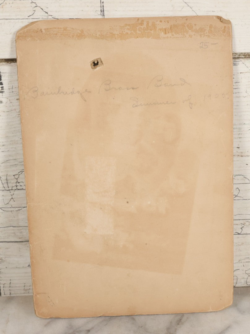 Lot 091 - Antique Boarded Photograph Of The Bainbridge Brass Band In Summer 1905 Posing Outdoors With Instruments