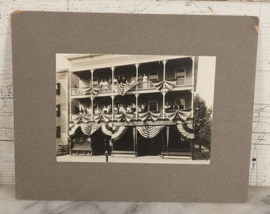 Lot 093 - Antique Boarded Photograph Of Spectators Watching From Balconies During A Patriotic Celebration With Bunting And American Flags In Photo