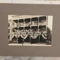 Lot 093 - Antique Boarded Photograph Of Spectators Watching From Balconies During A Patriotic Celebration With Bunting And American Flags In Photo