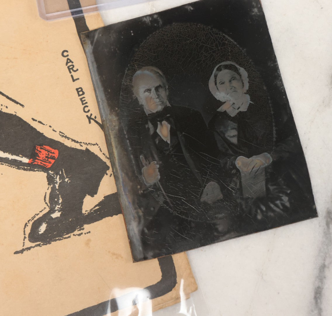 Lot 102 - Five Piece Ephemera Grouping Including "On, Wisconsin! March Song," Embroidered Forget Me Not Postcard, U.S.D.A. "Home Storage Of Vegetables" Booklet, Republican Election Ticket, And Tintype Of Elderly Man And Woman