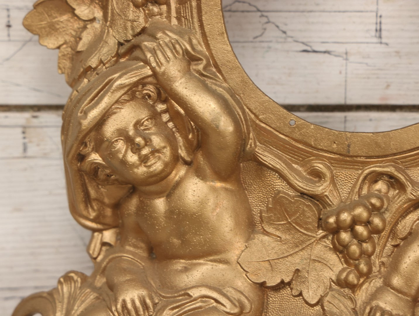Lot 009 - Antique Gold Painted Cast Metal Figural Clock Front With Cherubs And Grapes Motifs, Marked N. Muller, N.Y. No. 49 Patented 1856, 15" x 18-3/4"