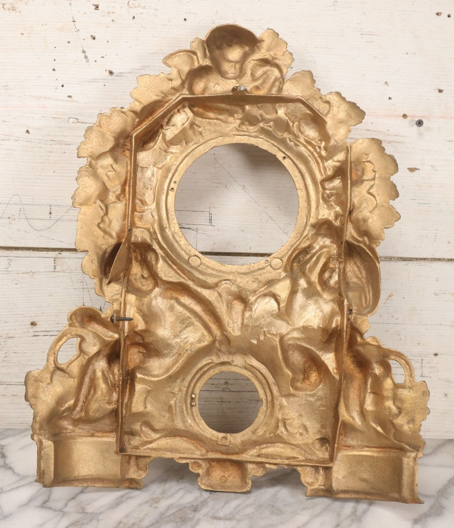 Lot 009 - Antique Gold Painted Cast Metal Figural Clock Front With Cherubs And Grapes Motifs, Marked N. Muller, N.Y. No. 49 Patented 1856, 15" x 18-3/4"