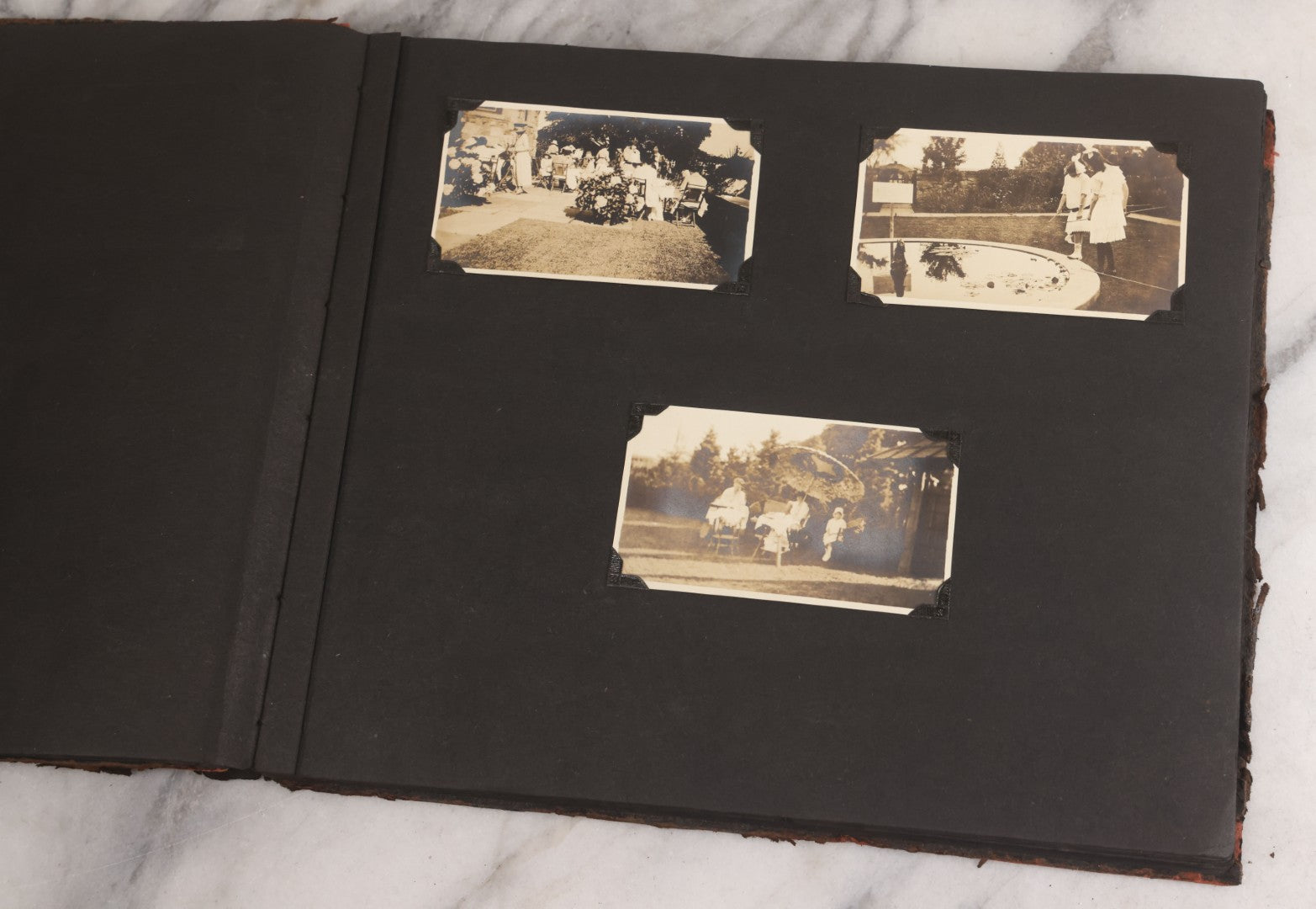 Lot 013 - Antique Snapshot Photo Album Containing 250+ Photographs Including Baseball Game & Player In An "Amherst" Jersey, Travel On Ship "Cape Diamond," Quebec, Italy, Hot Air Balloons, Early Passenger Airplane, Egyptian Pyramids And Sphinx, Circa 1920