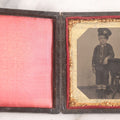 Lot 016 - Antique 1/6th Plate Tintype Photograph Of Young Boy Wearing Military Style Hat And Leaning Against Chair, In Full Intact Leatherette Union Case