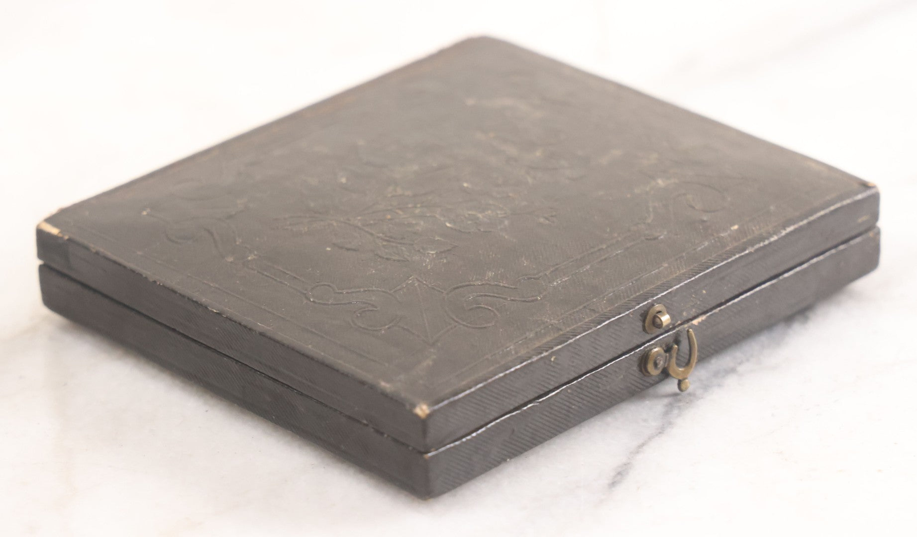 Lot 016 - Antique 1/6th Plate Tintype Photograph Of Young Boy Wearing Military Style Hat And Leaning Against Chair, In Full Intact Leatherette Union Case