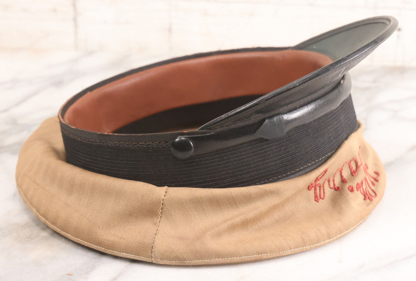 Lot 018 - Vintage "Tel's Dairy" Hand Embroidered Milkman's Cap With Red Stitching On Beige Fabric, Size 7-1/4