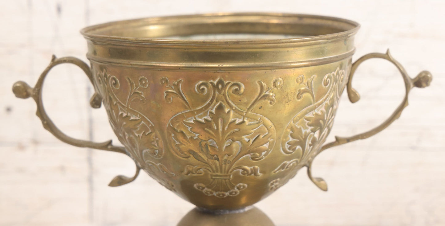 Lot 022 - Antique Pressed Brass Decorative Two-Handled Urn With Foliate Pattern Design And Weighted Base, 6-1/8" Height