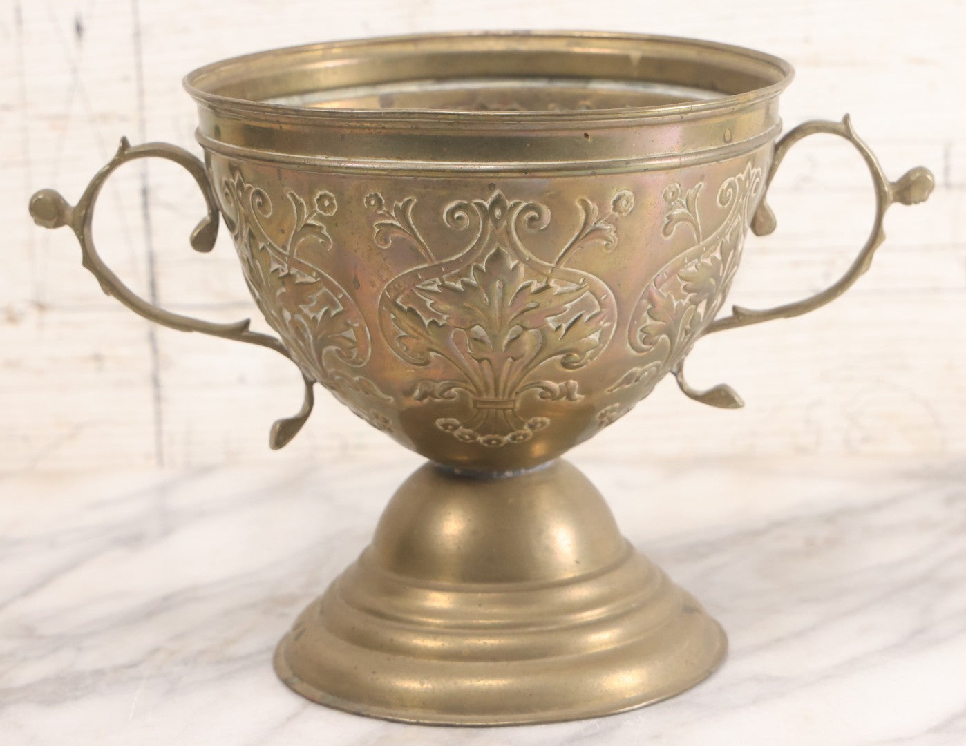 Lot 022 - Antique Pressed Brass Decorative Two-Handled Urn With Foliate Pattern Design And Weighted Base, 6-1/8" Height