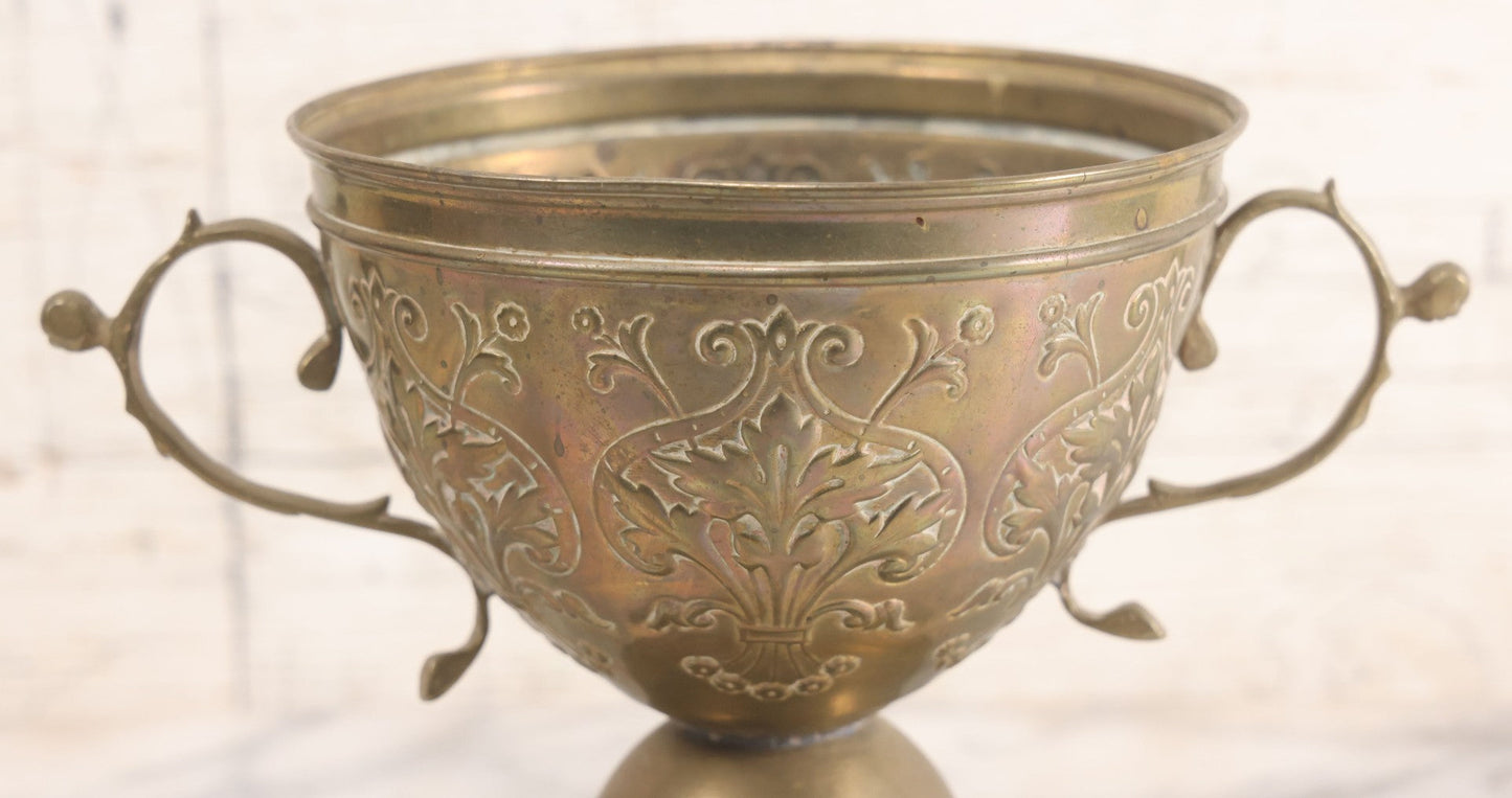 Lot 022 - Antique Pressed Brass Decorative Two-Handled Urn With Foliate Pattern Design And Weighted Base, 6-1/8" Height