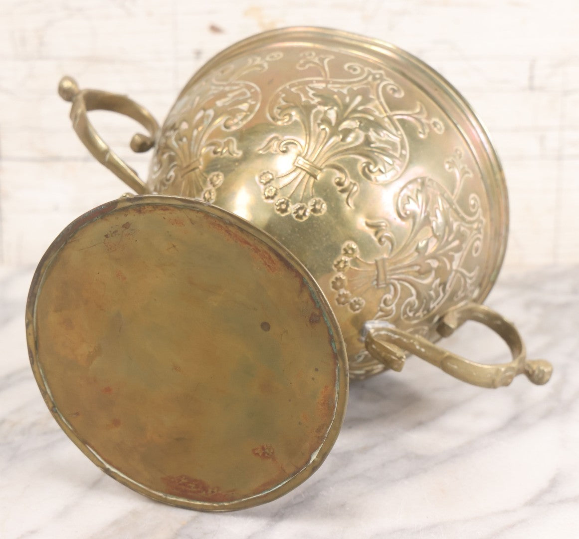 Lot 022 - Antique Pressed Brass Decorative Two-Handled Urn With Foliate Pattern Design And Weighted Base, 6-1/8" Height