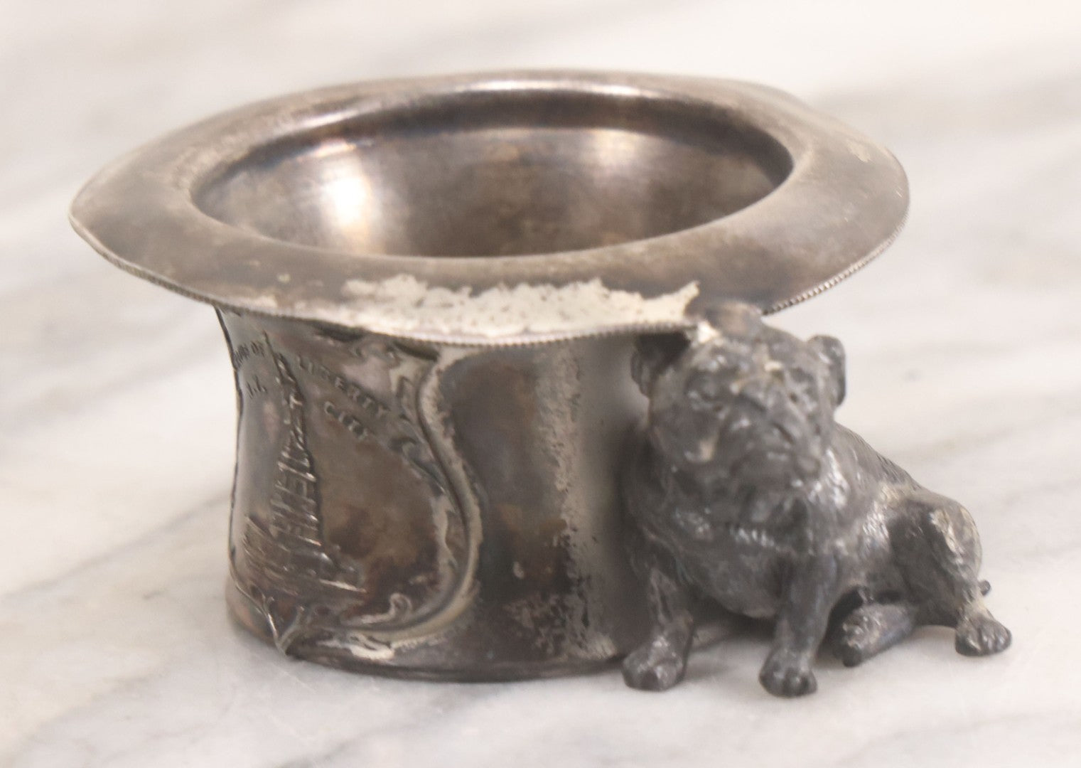 Lot 025 - Antique Souvenir Silverplate Metal Toothpick Holder With Bulldog Figure, Souvenir Of Statue Of Liberty, New York City, Manufactured By Kronheimer Oldenbusch & Co., 1-1/2" Height