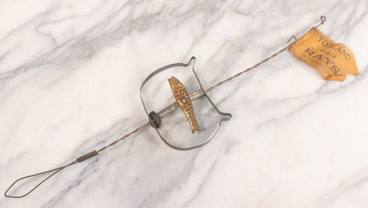 Lot 027 - Vintage Spinning Tin Fish Novelty Toy, Topped With Yellow Flag, "Toyland Rays: Home Of Santa Claus"