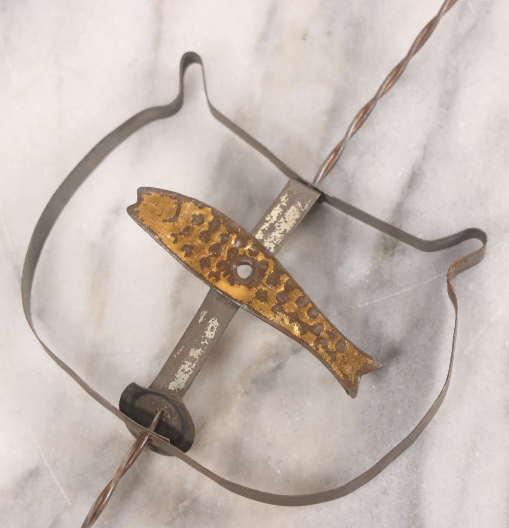 Lot 027 - Vintage Spinning Tin Fish Novelty Toy, Topped With Yellow Flag, "Toyland Rays: Home Of Santa Claus"