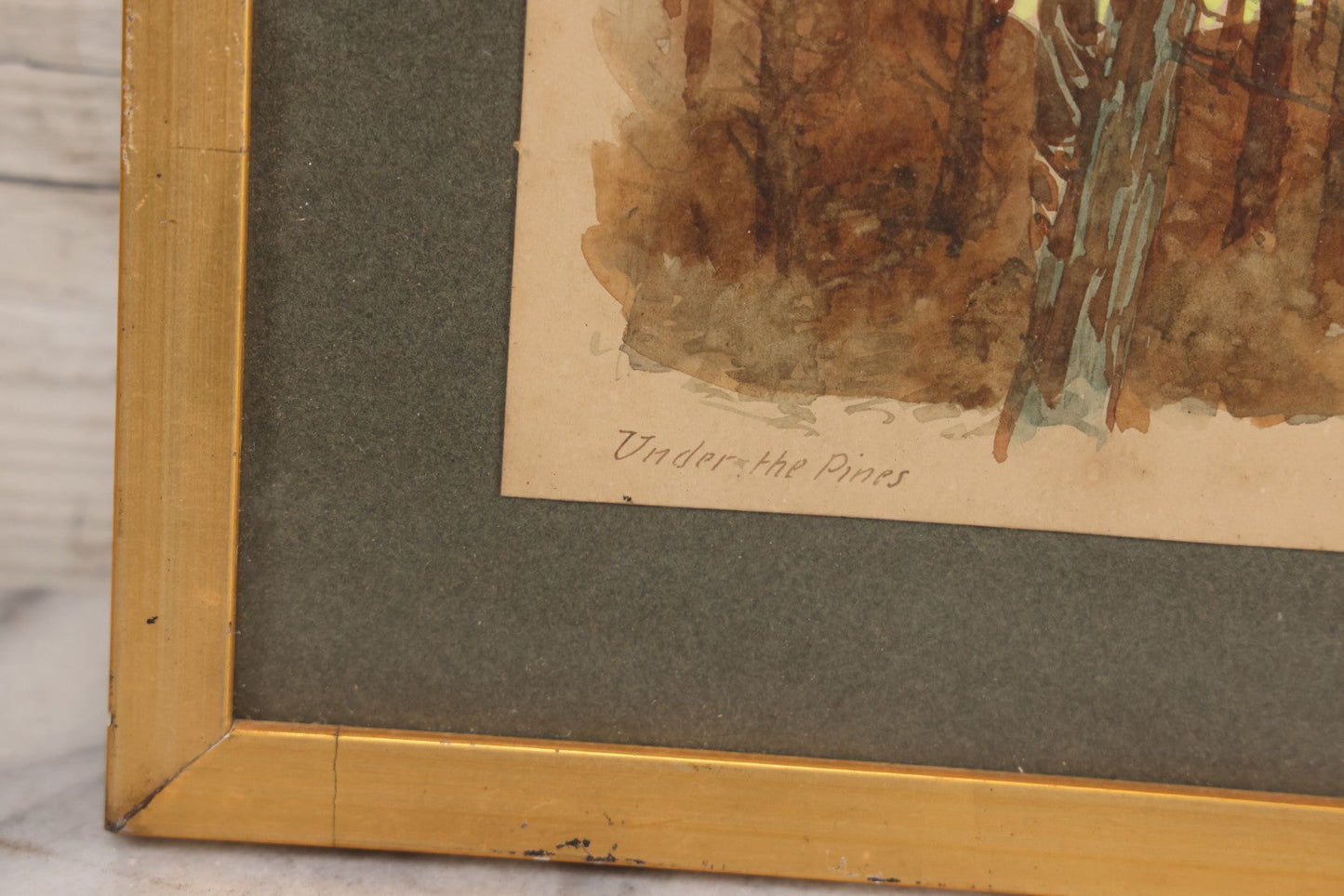 Lot 032 - Antique Watercolor Landscape Painting Of Pine Trees, Woods, Titled "Under The Pines," Unsigned, In Original Frame, Framed By Wilbur Emery Window Shades And And Picture Framing, Meredith, New Hampshire, 7-7/8" x 11-7/8"