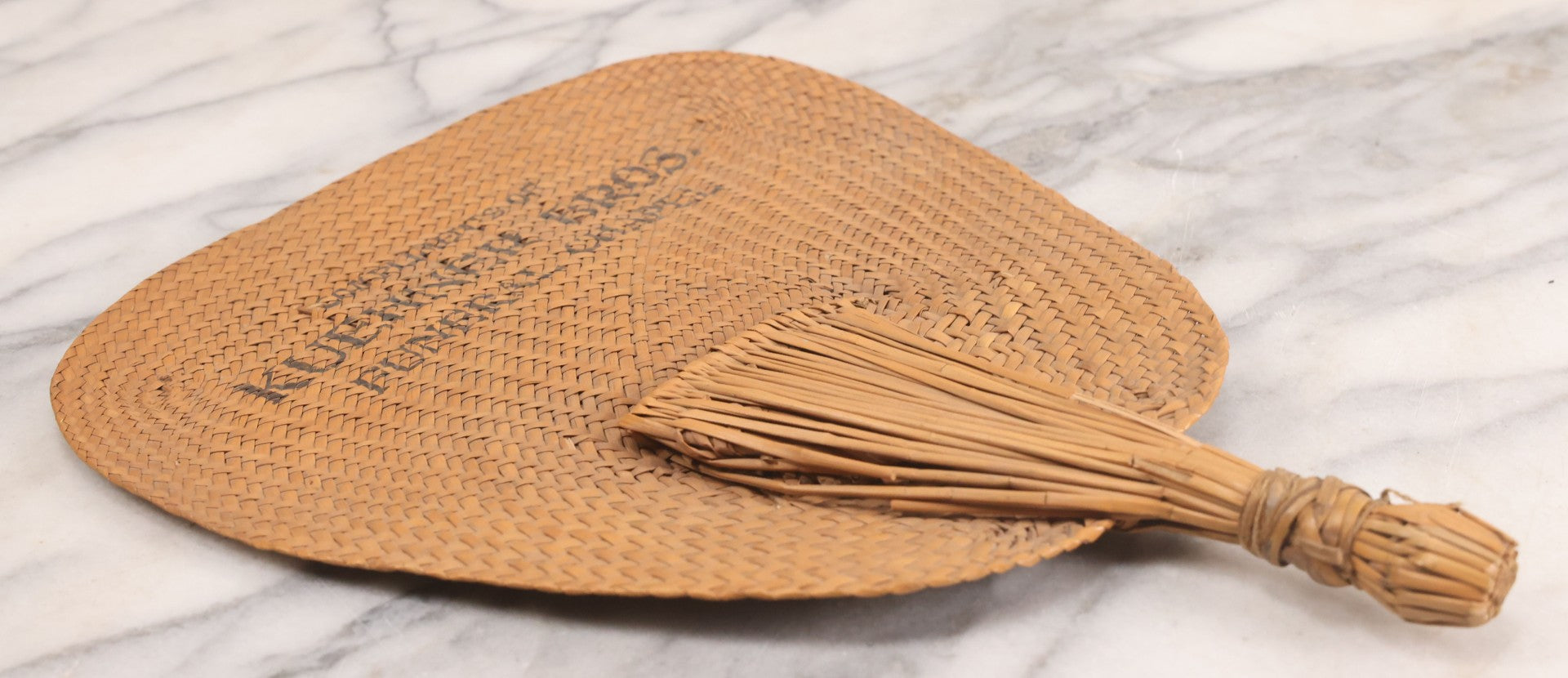 Lot 046 - Antique Woven Cane Advertising Funeral Fan, Compliments Of Kuehner Bros. Funeral Chapel