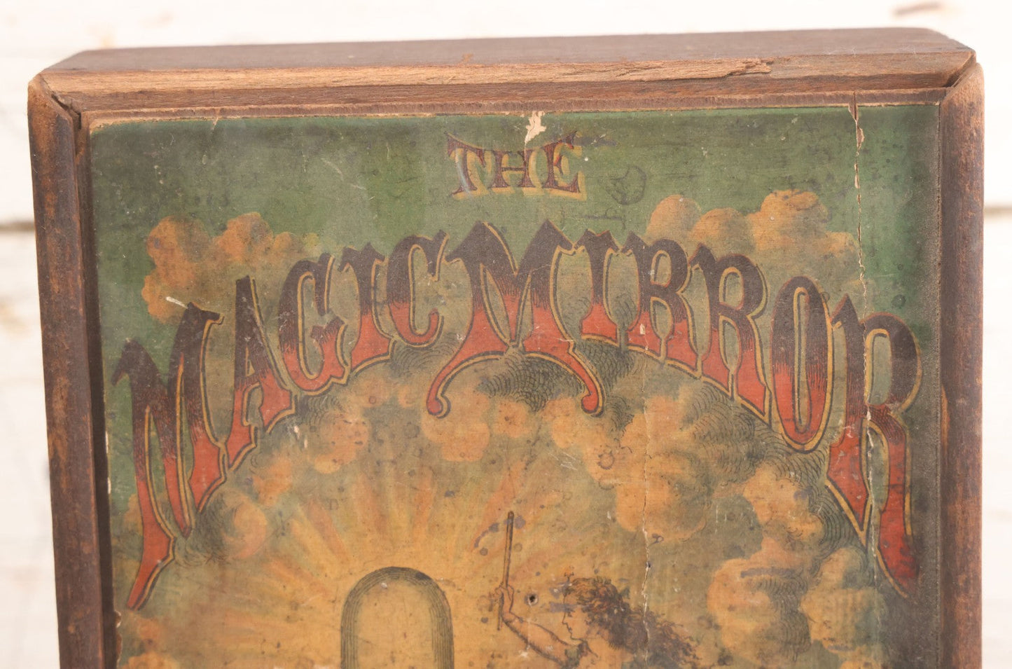 Lot 047 - Antique Lithographed Wooden Toy Box For "The Magic Mirror Or Wonderful Transformations" With Fairy Princess And Prince Characters, By Mcloughlin Bros., New York, Empty