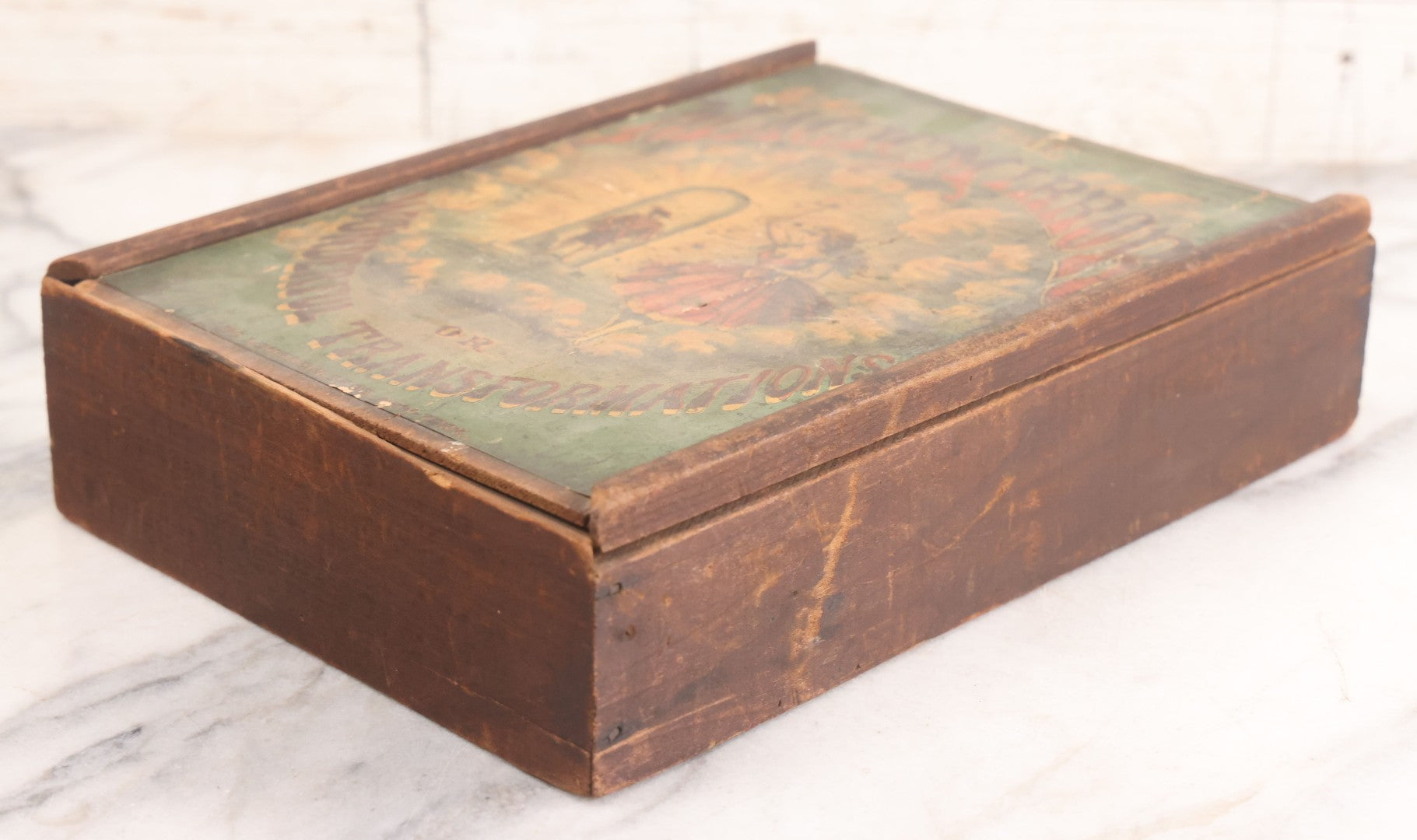 Lot 047 - Antique Lithographed Wooden Toy Box For "The Magic Mirror Or Wonderful Transformations" With Fairy Princess And Prince Characters, By Mcloughlin Bros., New York, Empty