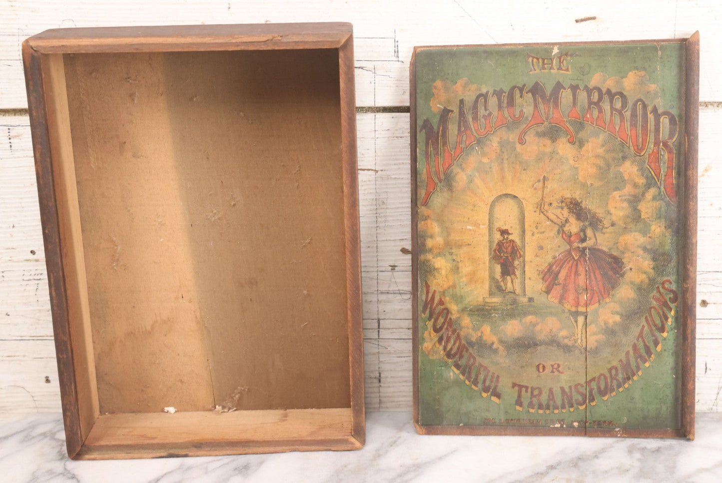 Lot 047 - Antique Lithographed Wooden Toy Box For "The Magic Mirror Or Wonderful Transformations" With Fairy Princess And Prince Characters, By Mcloughlin Bros., New York, Empty
