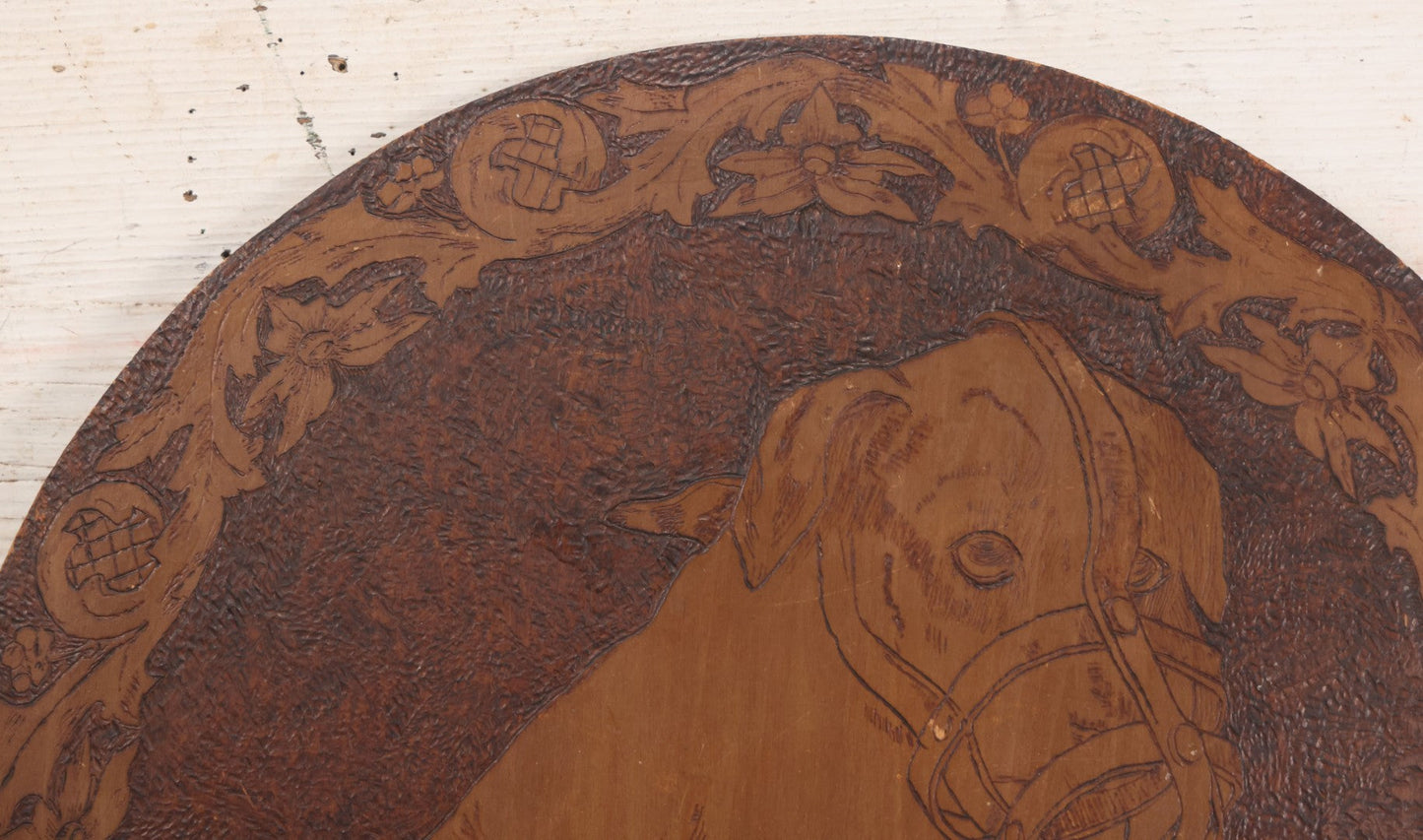 Lot 052 - Antique Pyrography Flemish Art Wood Burned Muzzled Puppy Dog Wall Hanger, 18" Diameter