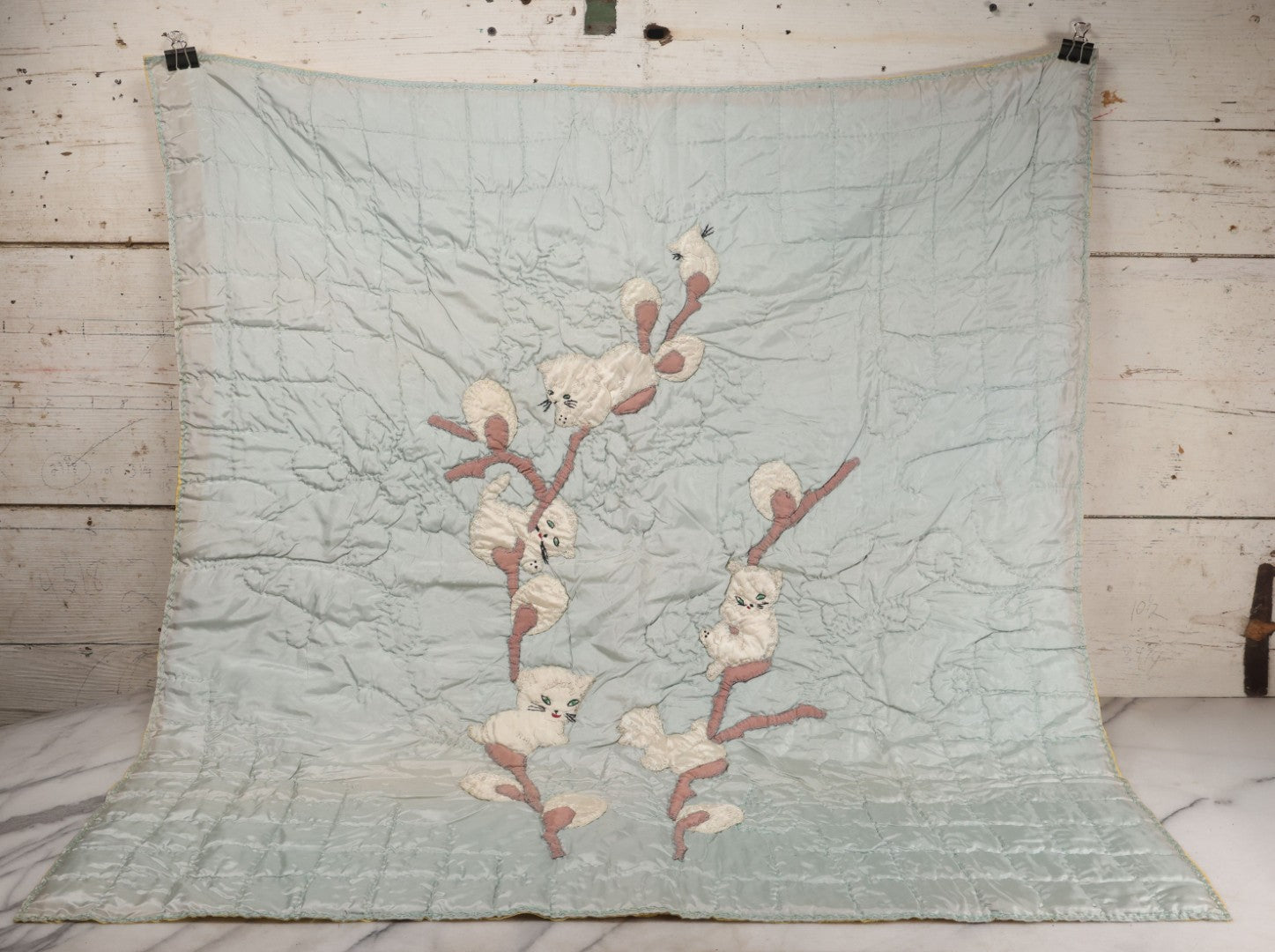 Lot 057 - Antique Hand Stitched Folk Art Quilt With White Kittens Climbing Cotton Plants, Robins Egg Blue Front And Yellow Reverse, Silk-Like Material, 39-1/2" x 42-1/2"